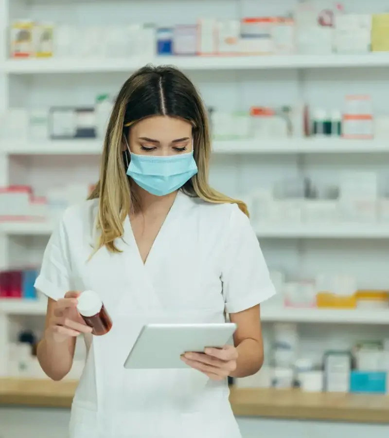 Pharmacist preparing medications in a Canadian pharmacy
