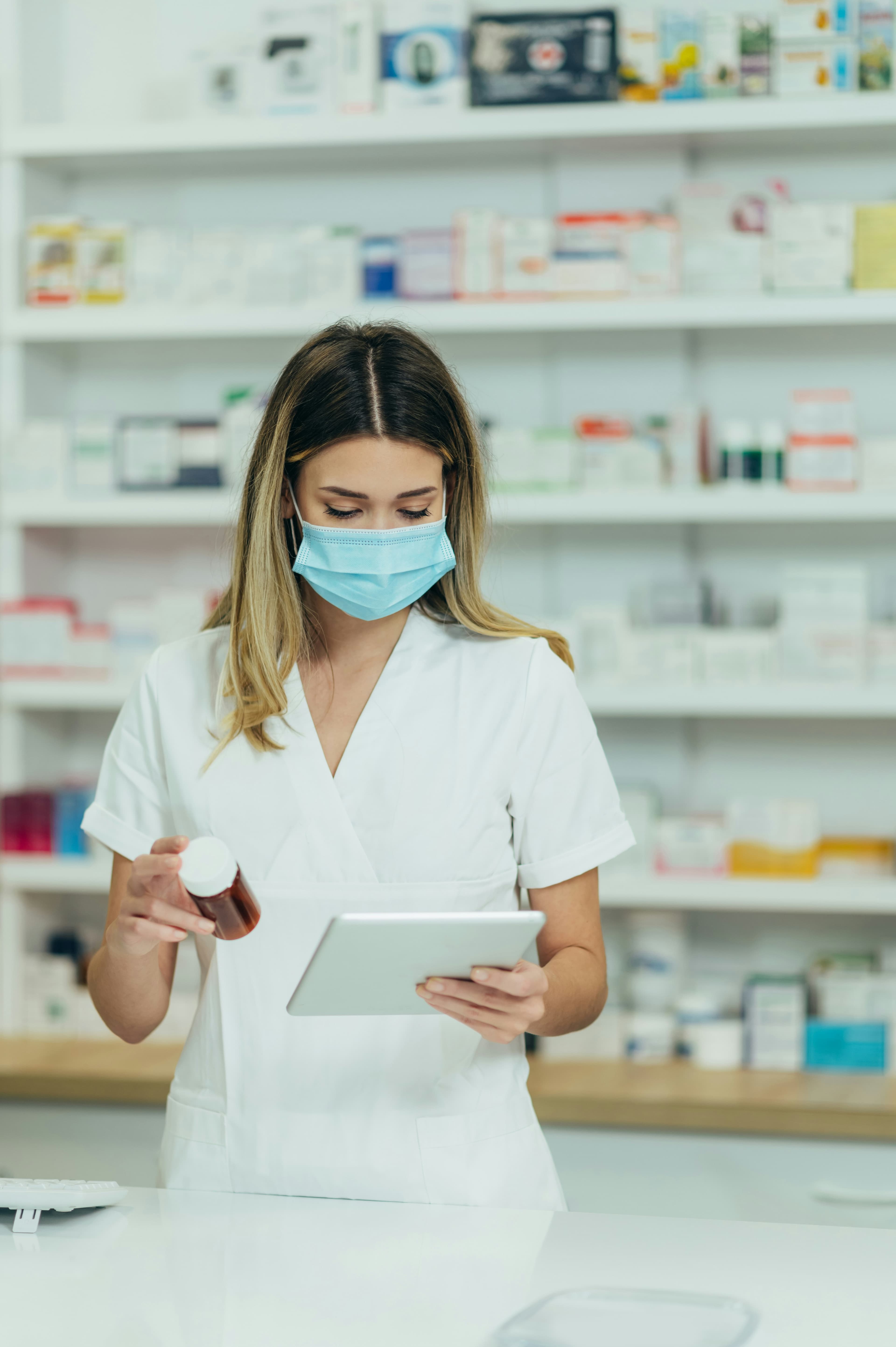 Pharmacist reviewing a prescription order
